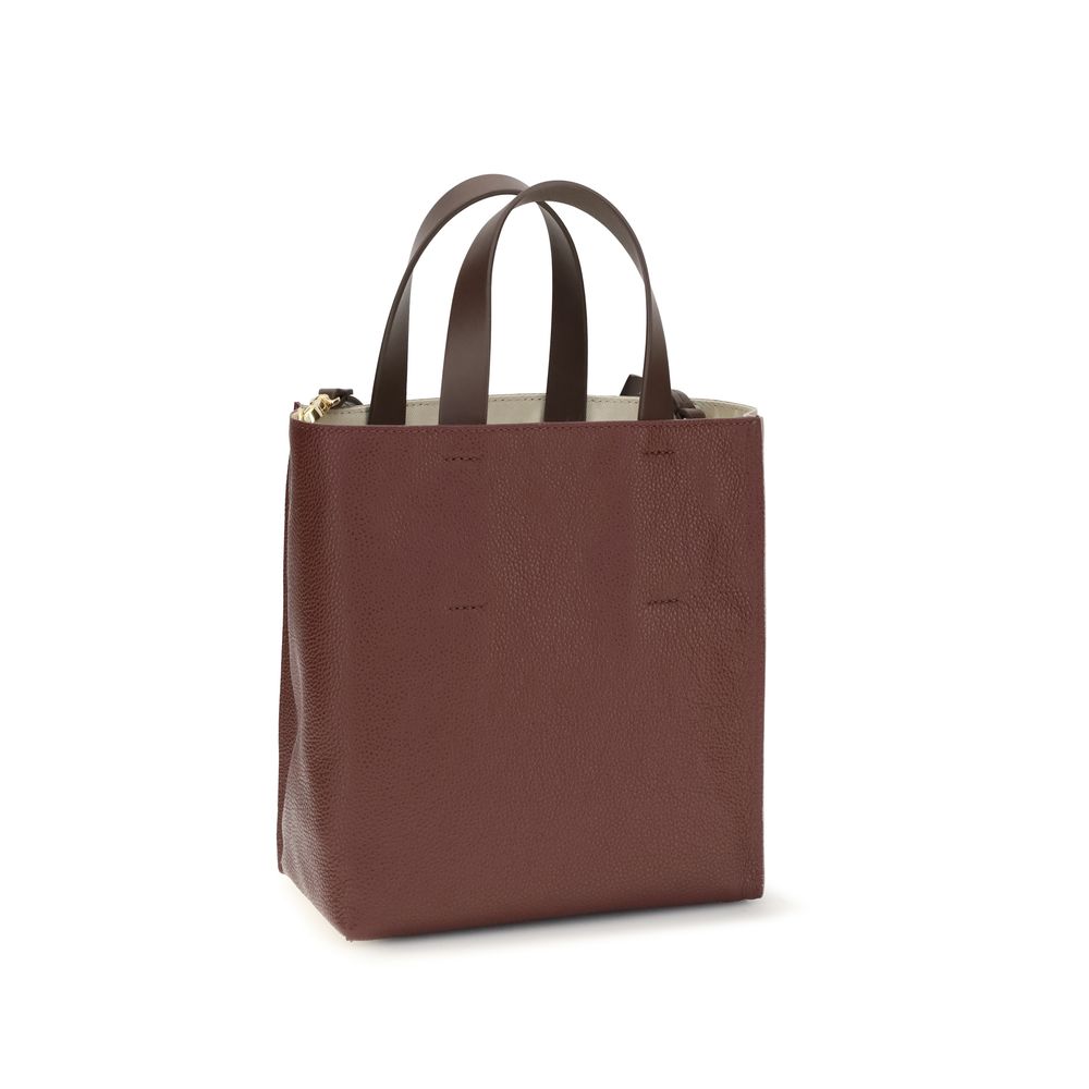 Mini 2-in-1 Shoulder & Crossbody Bag by Marni for women in bos taurus calf leather beige features a effortless chic silhouette with a secure zipper, ample , and versatile crossbody-strap, shoulder-strap, adjustable-strap & handle for a effortless chic finish.