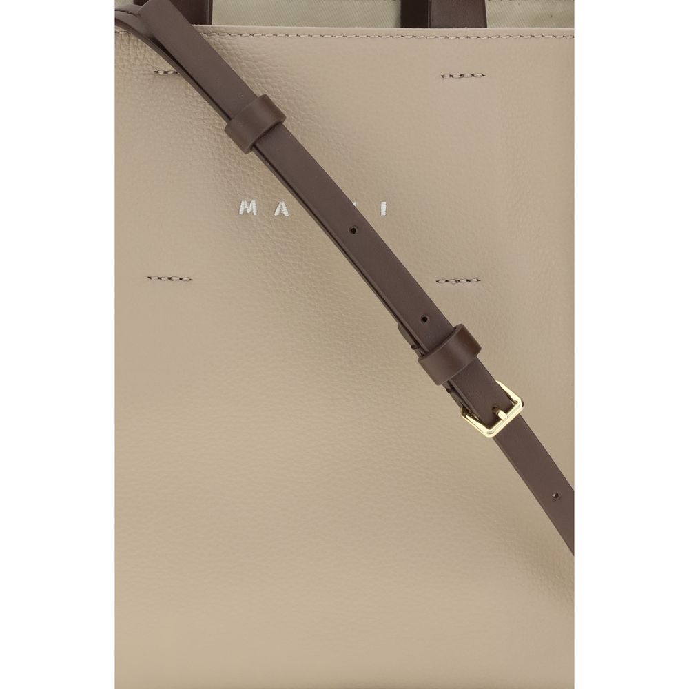 Mini 2-in-1 Shoulder & Crossbody Bag by Marni for women in bos taurus calf leather beige features a effortless chic silhouette with a secure zipper, ample , and versatile crossbody-strap, shoulder-strap, adjustable-strap & handle for a effortless chic finish.