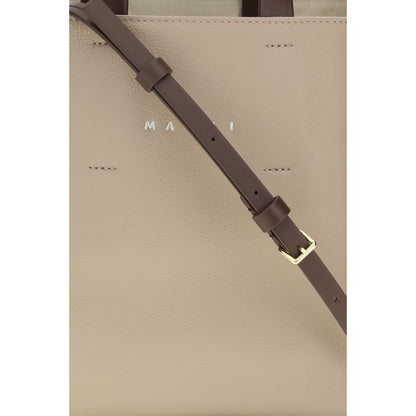 Mini 2-in-1 Shoulder & Crossbody Bag by Marni for women in bos taurus calf leather beige features a effortless chic silhouette with a secure zipper, ample , and versatile crossbody-strap, shoulder-strap, adjustable-strap & handle for a effortless chic finish.