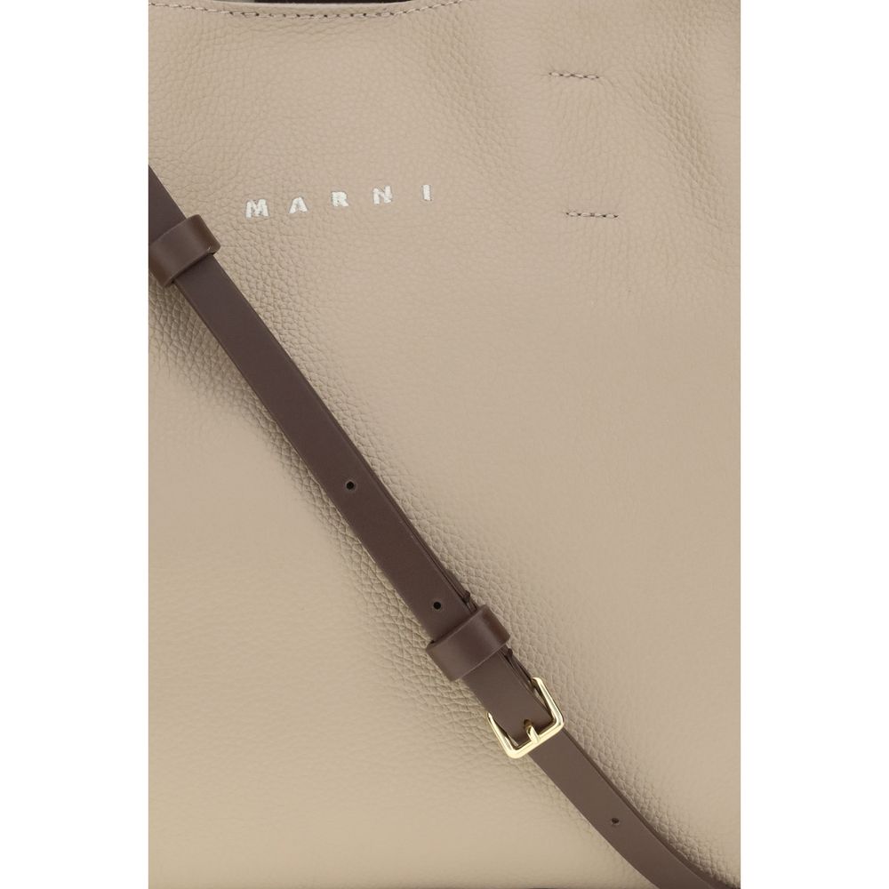 2-in-1 Shoulder & Crossbody East West Tote Bag by Marni for women in bos taurus calf leather beige features a distinguished silhouette, showcasing a secure and distinguished with versatile crossbody-strap, shoulder-strap, handle & detachable-strap for a distinguished finish.