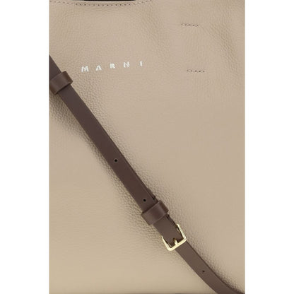 2-in-1 Shoulder & Crossbody East West Tote Bag by Marni for women in bos taurus calf leather beige features a distinguished silhouette, showcasing a secure and distinguished with versatile crossbody-strap, shoulder-strap, handle & detachable-strap for a distinguished finish.