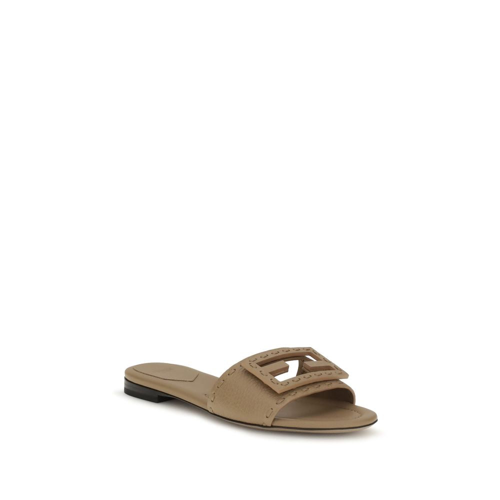 Flat Sandals by Fendi for women in bos taurus calfskin leather beige & print features an statuesque Women's Bos Taurus Calfskin Leather Flat Sandals silhouette with a refined flat and elegant round toe style.