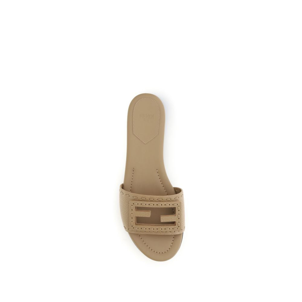 Flat Sandals by Fendi for women in bos taurus calfskin leather beige & print features an architectural design from the Women's Bos Taurus Calfskin Leather Flat Sandals collection, defined by a architectural flat and round toe style for a architectural finish.