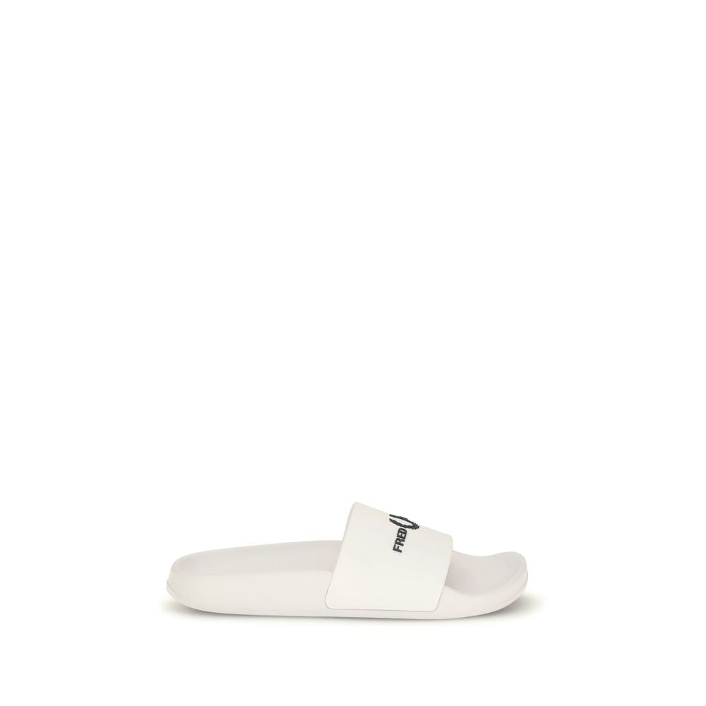 Slider Sandals by Fred Perry for men in thermoplastic polyurethane and white presents a captivating silhouette, showcasing the signature style of the Perry Men's Thermoplastic Polyurethane Slider Sandals with a captivating and captivating .