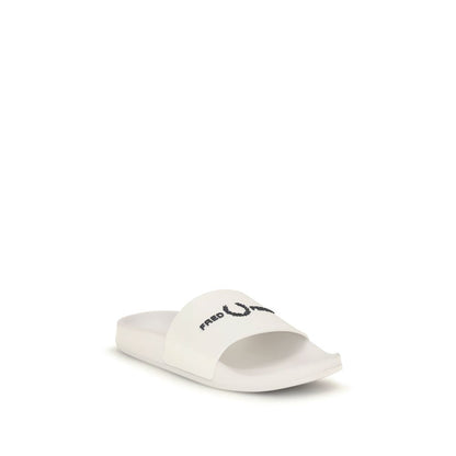 Slider Sandals by Fred Perry for men in thermoplastic polyurethane white presents a sculptural silhouette, showcasing the Perry Men's Thermoplastic Polyurethane Slider Sandals design with a sculptural and for a premium look.
