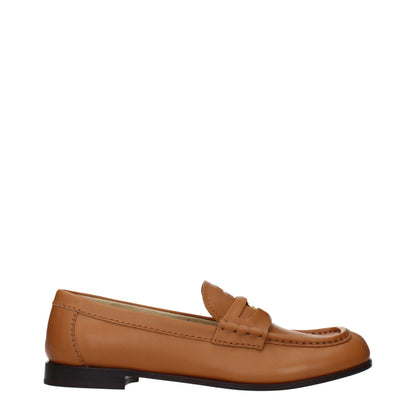 Flat Loafer Slip-On Shoes by Miu Miu for women in leather brown showcases a resplendent Women's Leather Flat Loafer Slip-On Shoes aesthetic, defined by its resplendent and elegant flat.