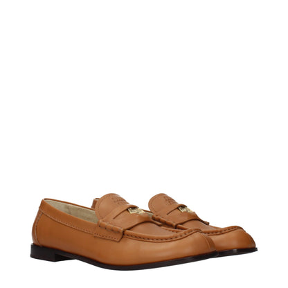 Flat Loafer Slip-On Shoes by Miu Miu for women in leather brown showcases a timeless silhouette from the Women's Leather Flat Loafer Slip-On Shoes collection, featuring a timeless flat and for a timeless finish.