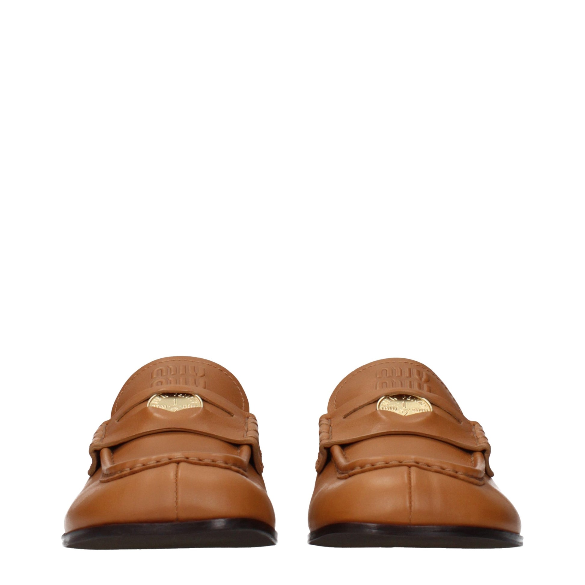 Flat Loafer Slip-On Shoes by Miu Miu for women in leather brown features an ergonomic silhouette, perfectly showcasing Women's Leather Flat Loafer Slip-On Shoes with its distinct flat and elegant .
