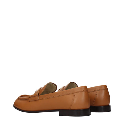 Flat Loafer Slip-On Shoes by Miu Miu for women in leather brown features an dynamic silhouette from the Women's Leather Flat Loafer Slip-On Shoes collection, defined by a dynamic and flat for a dynamic look.