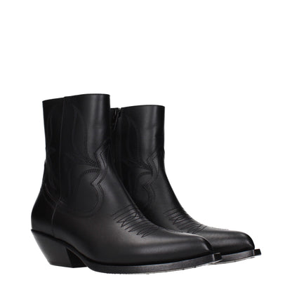 Ankle Boots by Celine for women in leather black features an high-performance silhouette, showcasing the sophisticated design of the Women's Leather Ankle Boots with a and a refined .