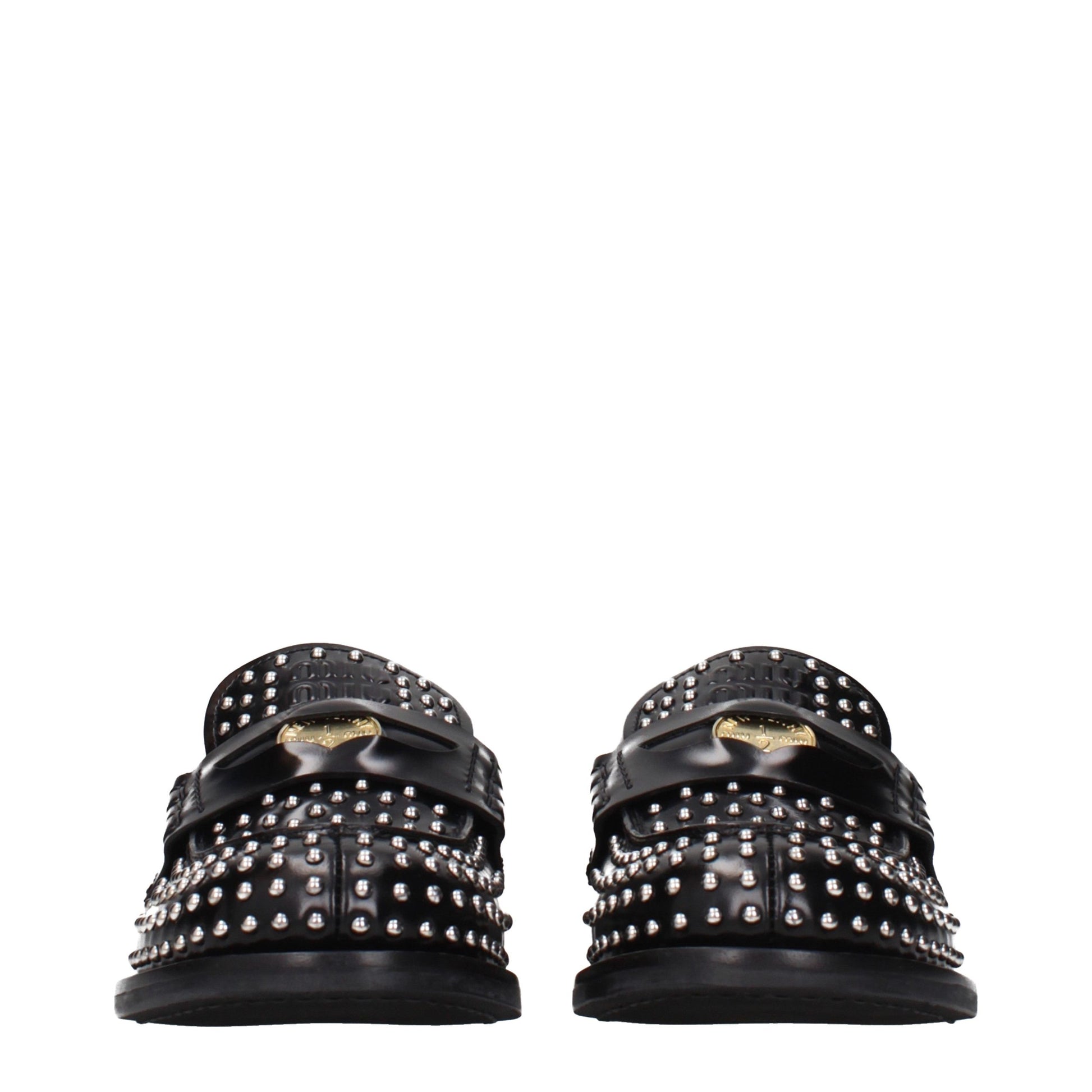 Flat Loafer Slip-On Shoes by Miu Miu for women in leather black showcases a impeccable silhouette as Women's Leather Flat Loafer Slip-On Shoes, artfully designed with a impeccable flat and refined for a impeccable finish.