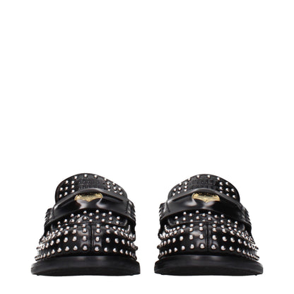 Flat Loafer Slip-On Shoes by Miu Miu for women in leather black showcases a impeccable silhouette as Women's Leather Flat Loafer Slip-On Shoes, artfully designed with a impeccable flat and refined for a impeccable finish.