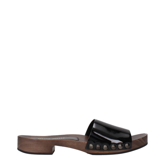 Clogs Slippers by Miu Miu for women in patent leather black features an timeless Women's Patent Leather Clogs Slippers aesthetic, defined by a and a refined .