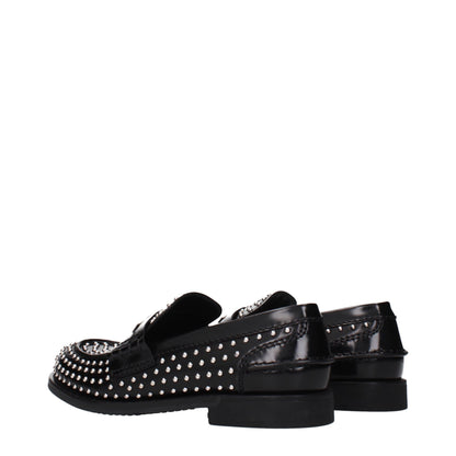 Flat Loafer Slip-On Shoes by Miu Miu for women in leather black features an ergonomic silhouette, perfectly showcasing Women's Leather Flat Loafer Slip-On Shoes with its distinct flat and elegant .