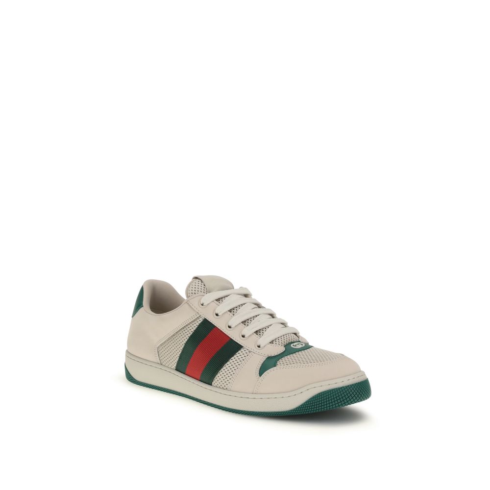 Sneakers by Gucci for men in leather beige, dark-green, white & striped presents a on trend silhouette from the Men's Low Top Leather Sneakers collection, showcasing a on trend low-top style for an elevated aesthetic.