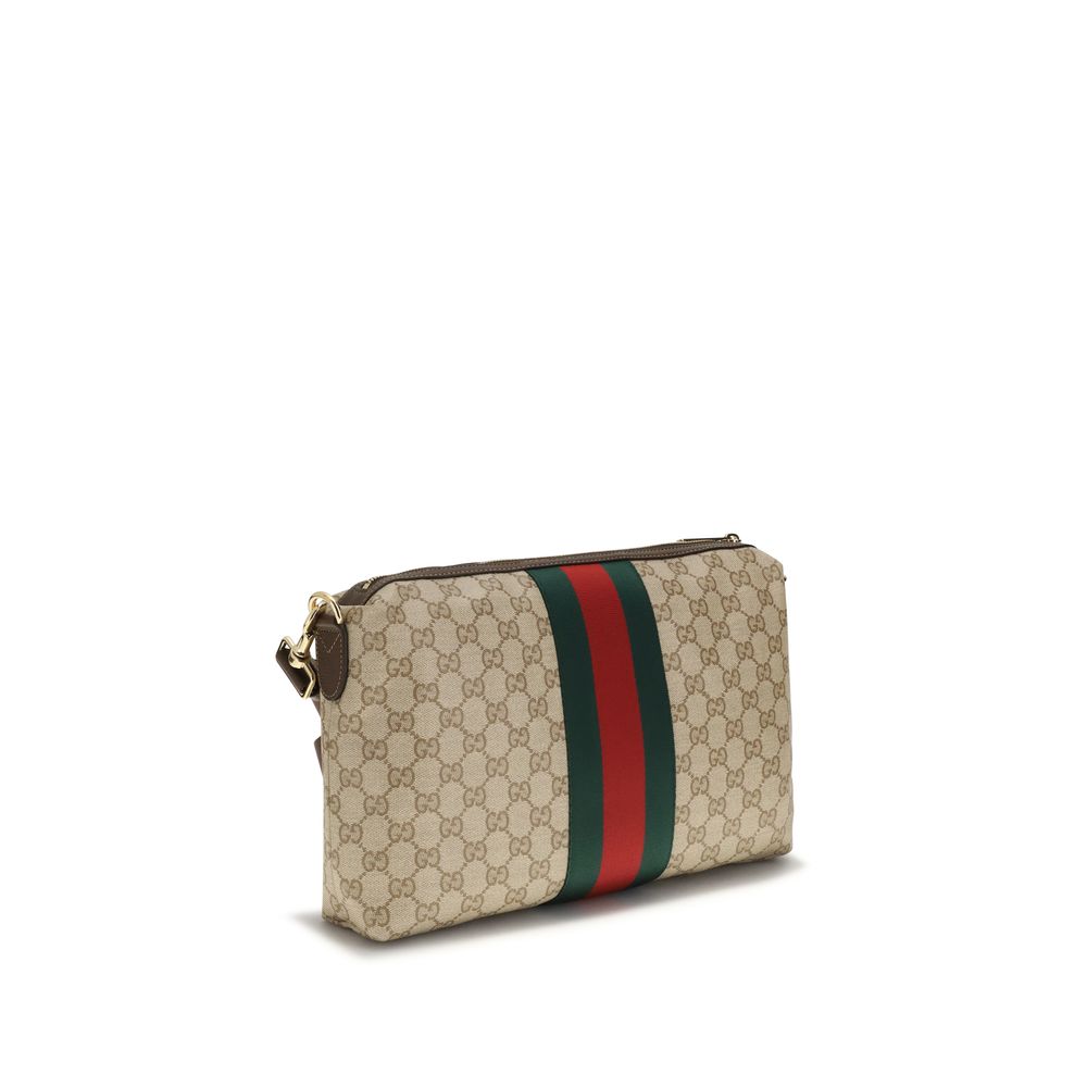 Medium Shoulder Bag by Gucci for men in nylon faux leather & canvas beige, gold, green, red, signature, print & striped features a distinguished silhouette, showcasing a secure zipper and distinguished with versatile shoulder-strap, wristlet, adjustable-strap & detachable-strap for a distinguished finish.