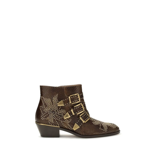 Cuban Ankle Cowboy Boots by Chloé for women in bos taurus leather brown & signature features an effortless chic silhouette from the Women's Bos Taurus Leather Cuban Ankle Cowboy Boots collection, showcasing a effortless chic cuban-heel and refined for an effortless chic look.