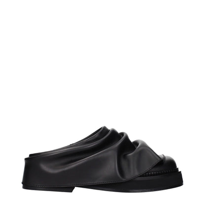 Clogs Slippers from The Attico for women in leather black features a dynamic design from the Women's Leather Clogs Slippers collection, highlighting a with a and functional .