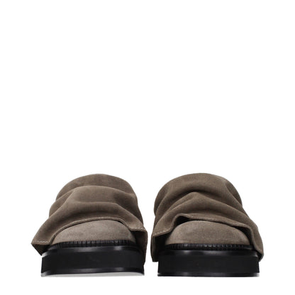 Clogs Slippers by The Attico for women in suede leather gray features an effortlessly elegant silhouette, showcasing the Women's Suede Leather Clogs Slippers design with an effortlessly elegant and a for a effortlessly elegant look.