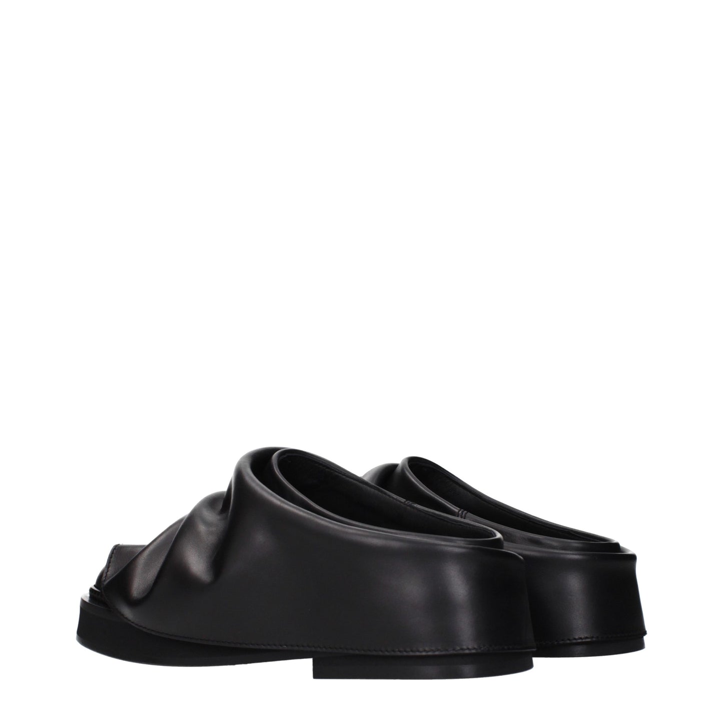 Clogs Slippers by The Attico for women in leather and black presents a sculptural silhouette as Women's Leather Clogs Slippers, featuring a sculptural and a sculptural for refined comfort.