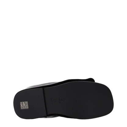 Clogs Slippers by The Attico for women in leather black presents a effortless silhouette, showcasing the elegant Women's Leather Clogs Slippers design with its unique and sophisticated .