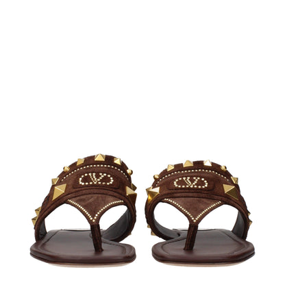 Flip-Flop Sandals by Valentino Garavani for women in suede leather brown presents a sculptural silhouette, showcasing the Women's Suede Leather Flip-Flop Sandals design with a sculptural and for a premium look.