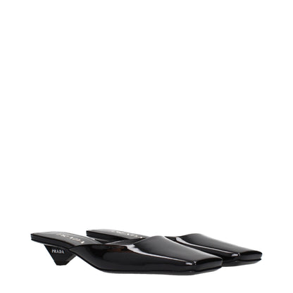 Flat Sandals by Prada for women in patent leather black presents a sculptural silhouette, showcasing the Women's Patent Leather Flat Sandals design with a sculptural flat and for a premium look.