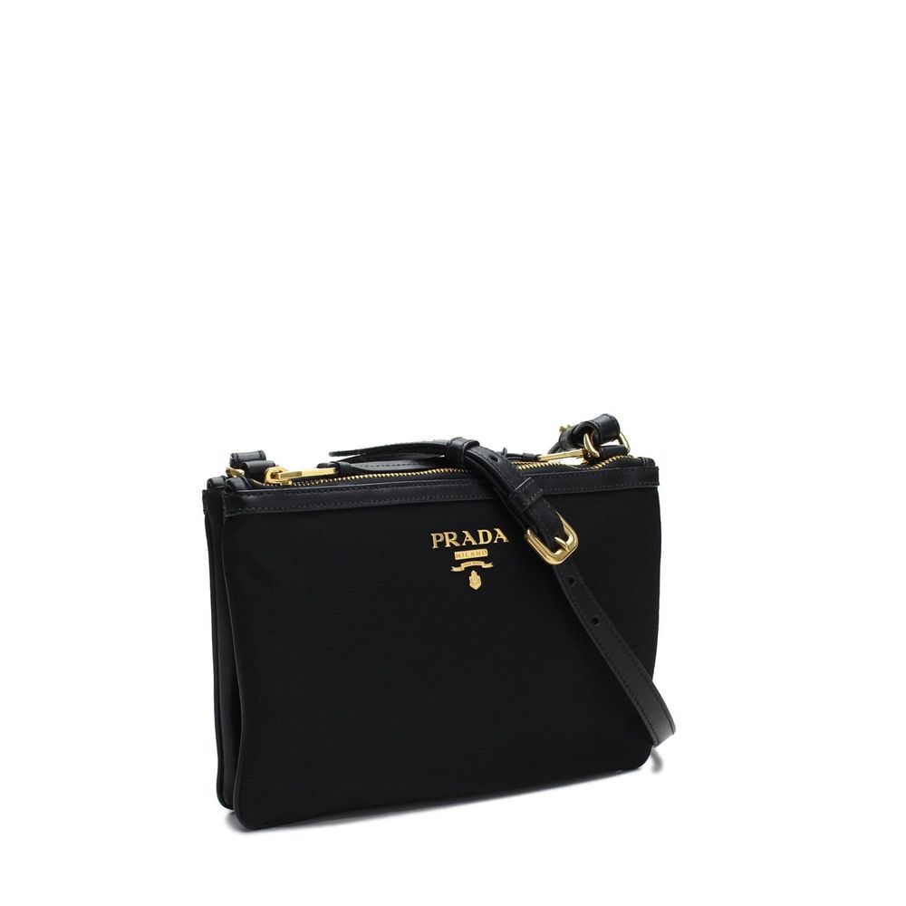 Crossbody Handbag by Prada for women in nylon black & gold features a versatile chic silhouette, meticulously detailed with a secure zipper, ample , and versatile crossbody-strap, shoulder-strap & detachable-strap.