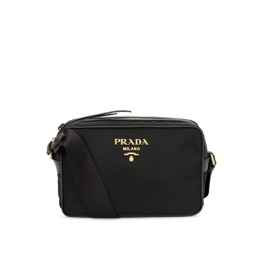 Shoulder Bag by Prada for women in nylon & leather black showcases a statuesque silhouette, artfully detailed with a secure zipper, organized , and versatile shoulder-strap & detachable-strap for a statuesque look.