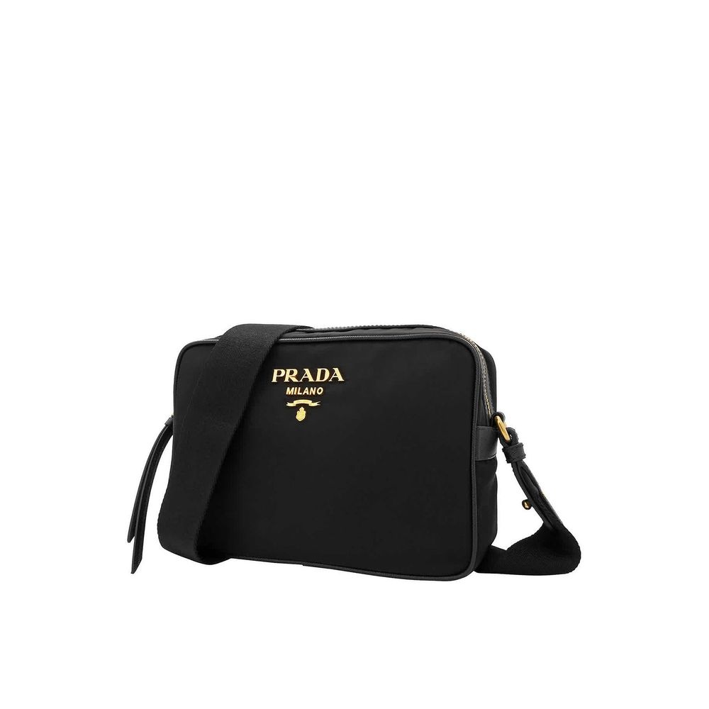 Shoulder Bag by Prada for women in nylon & leather black features a effortless sophistication silhouette, secured by a zipper with ample and versatile shoulder-strap & detachable-strap for a effortless sophistication finish.