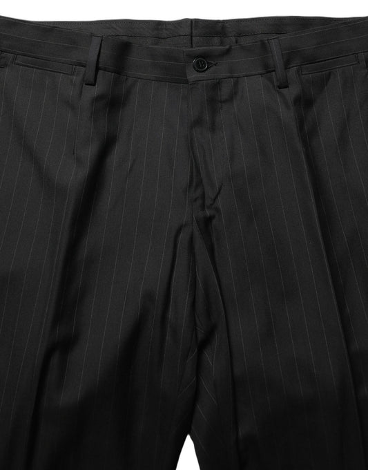 This Pant Suit by Dolce & Gabbana for men in virgin wool silk viscose & cupro black & striped presents a discerning silhouette, featuring a sophisticated wrap single-breasted neckline and a discerning slim for a refined and polished look.