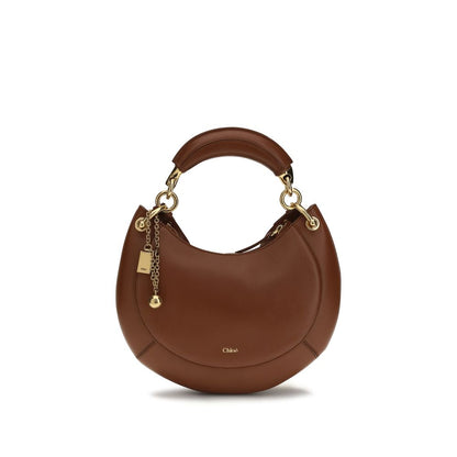 Shoulder Bag by Chloé for women in bio-acetate cotton & bos taurus calf leather brown features a effortless sophistication silhouette, secured by a buckle with ample external-pockets & cardholder and versatile shoulder-strap & adjustable-strap for a effortless sophistication finish.