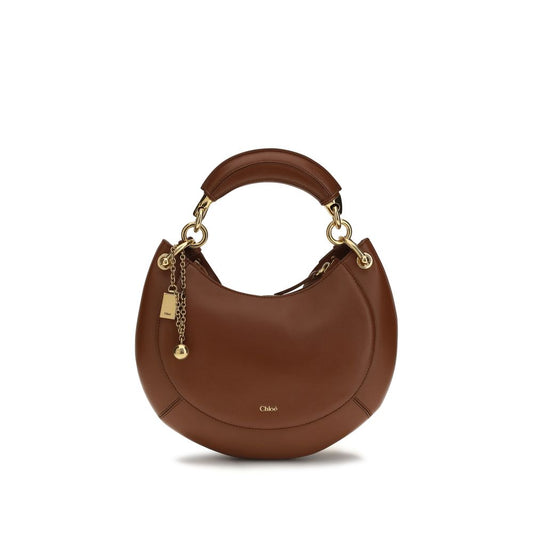 Shoulder Bag by Chloé for women in bio-acetate cotton & bos taurus calf leather brown features a effortless sophistication silhouette, secured by a buckle with ample external-pockets & cardholder and versatile shoulder-strap & adjustable-strap for a effortless sophistication finish.