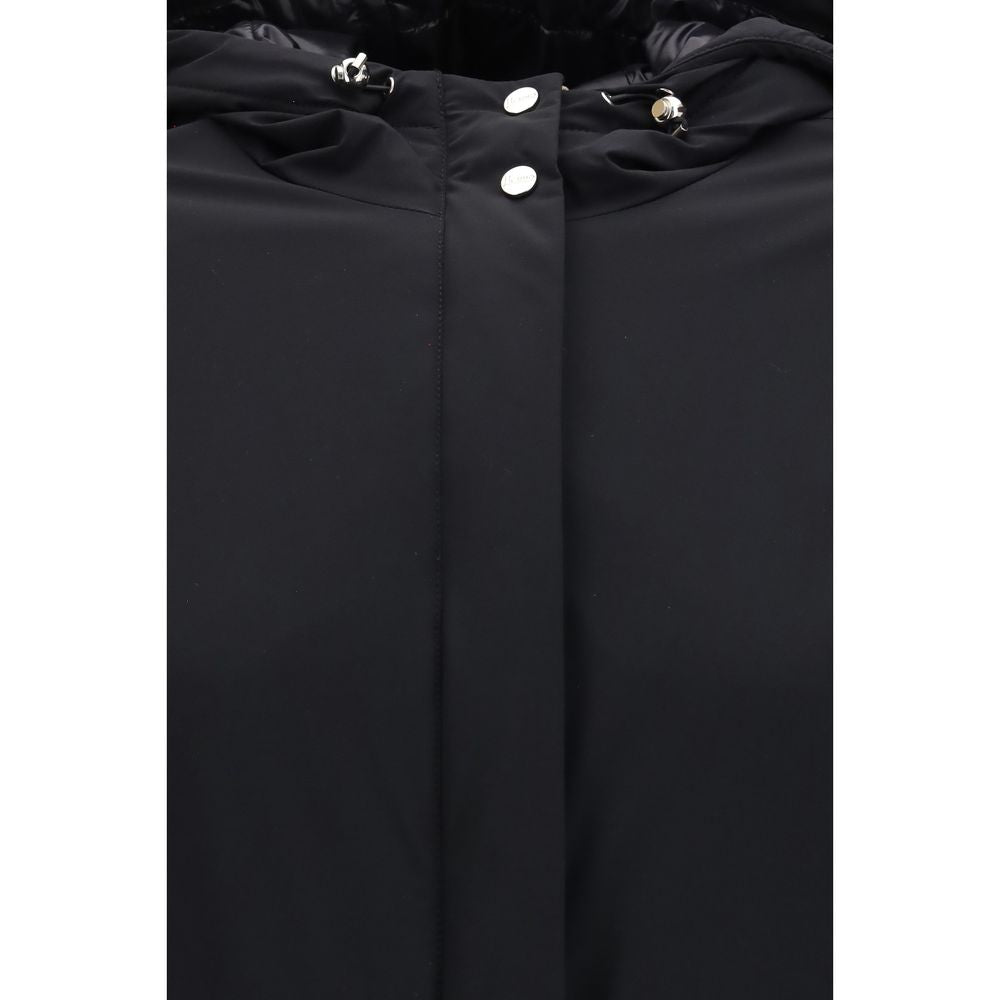 Hooded Puffer Jacket by Herno for women in stretch polyamide polyester black showcases a bohemian silhouette, artfully detailed with a bohemian and signature lightweight, pockets, hooded, insulated & windproof for a truly bohemian finish.