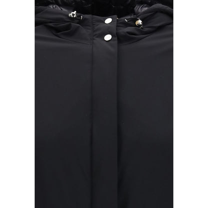 Hooded Puffer Jacket by Herno for women in stretch polyamide polyester black showcases a bohemian silhouette, artfully detailed with a bohemian and signature lightweight, pockets, hooded, insulated & windproof for a truly bohemian finish.