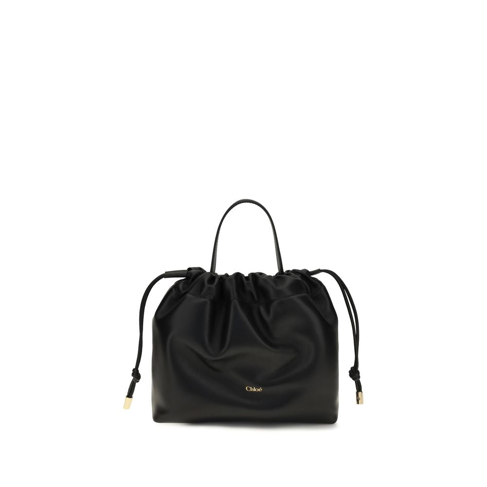Mini Crossbody Drawstring Shoulder Bag by Chloé for women in nappa lambskin leather black features a enviable silhouette, showcasing a secure drawstring, ample , and enviable crossbody-strap, shoulder-strap & handle for a enviable finish.
