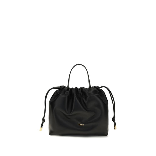 Mini Crossbody Drawstring Shoulder Bag by Chloé for women in nappa lambskin leather black features a enviable silhouette, showcasing a secure drawstring, ample , and enviable crossbody-strap, shoulder-strap & handle for a enviable finish.