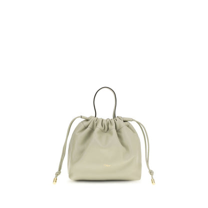Shoulder Drawstring Bag by Chloé for women in nappa lambskin leather gray features a effortless chic silhouette with a secure drawstring, ample , and versatile shoulder-strap & handle for a effortless chic finish.