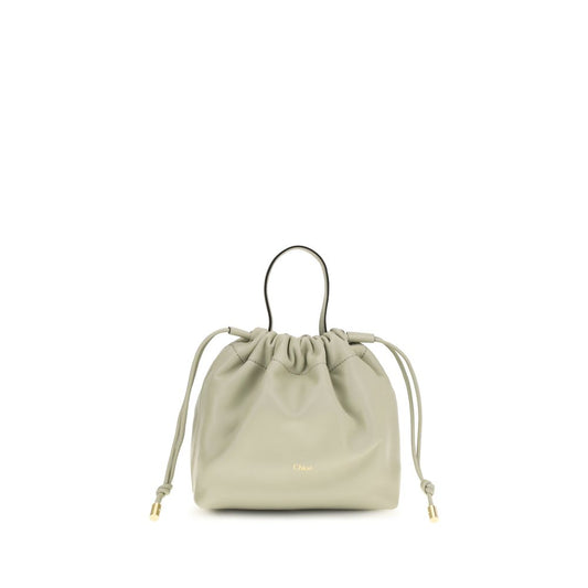 Shoulder Drawstring Bag by Chloé for women in nappa lambskin leather gray features a effortless chic silhouette with a secure drawstring, ample , and versatile shoulder-strap & handle for a effortless chic finish.