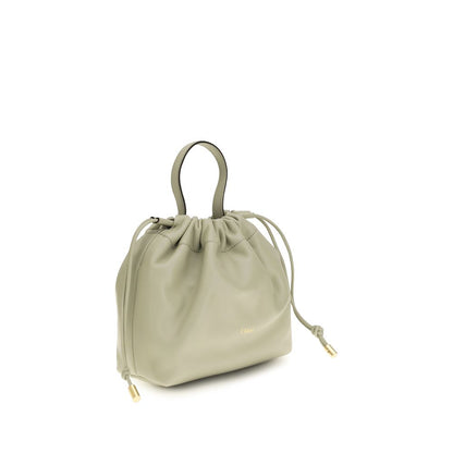 Shoulder Drawstring Bag by Chloé for women in nappa lambskin leather gray features a distinguished silhouette, showcasing a secure drawstring and distinguished with versatile shoulder-strap & handle for a distinguished finish.