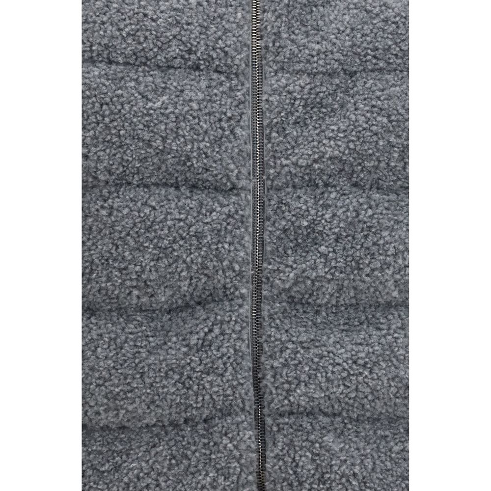 Vest by Herno for women in polyester gray showcases a dynamic silhouette, perfectly balancing pockets & insulated with a dynamic for a sophisticated, high-fashion look.
