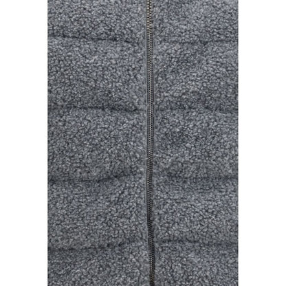 Vest by Herno for women in polyester gray showcases a dynamic silhouette, perfectly balancing pockets & insulated with a dynamic for a sophisticated, high-fashion look.
