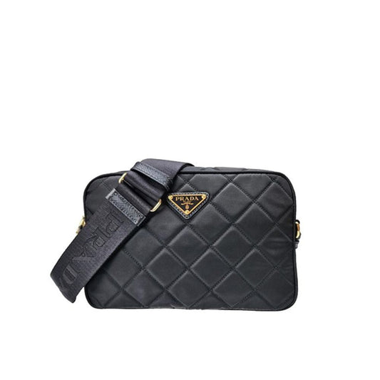 Shoulder Bag by Prada for women in nylon black showcases a statuesque silhouette, artfully detailed with a secure zipper, organized , and versatile shoulder-strap & detachable-strap for a statuesque look.