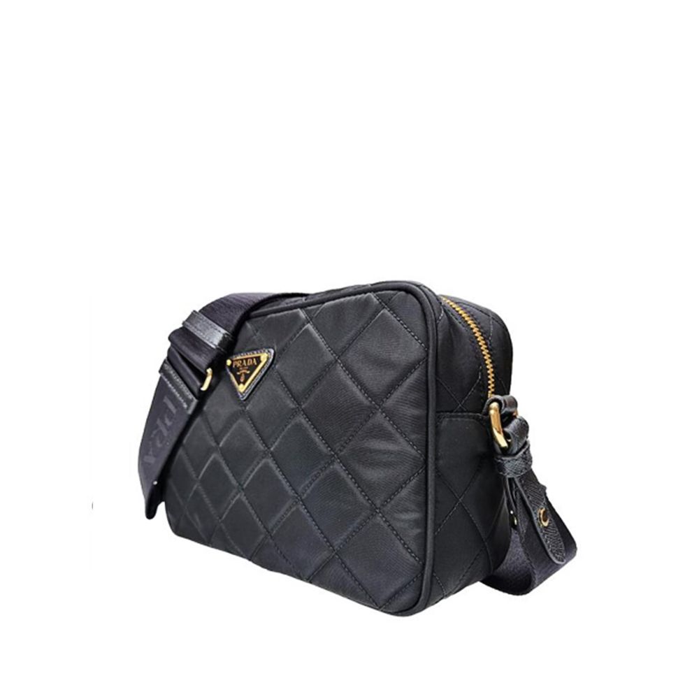 Shoulder Bag by Prada for women in nylon black features a effortless sophistication silhouette, secured by a zipper with ample and versatile shoulder-strap & detachable-strap for a effortless sophistication finish.