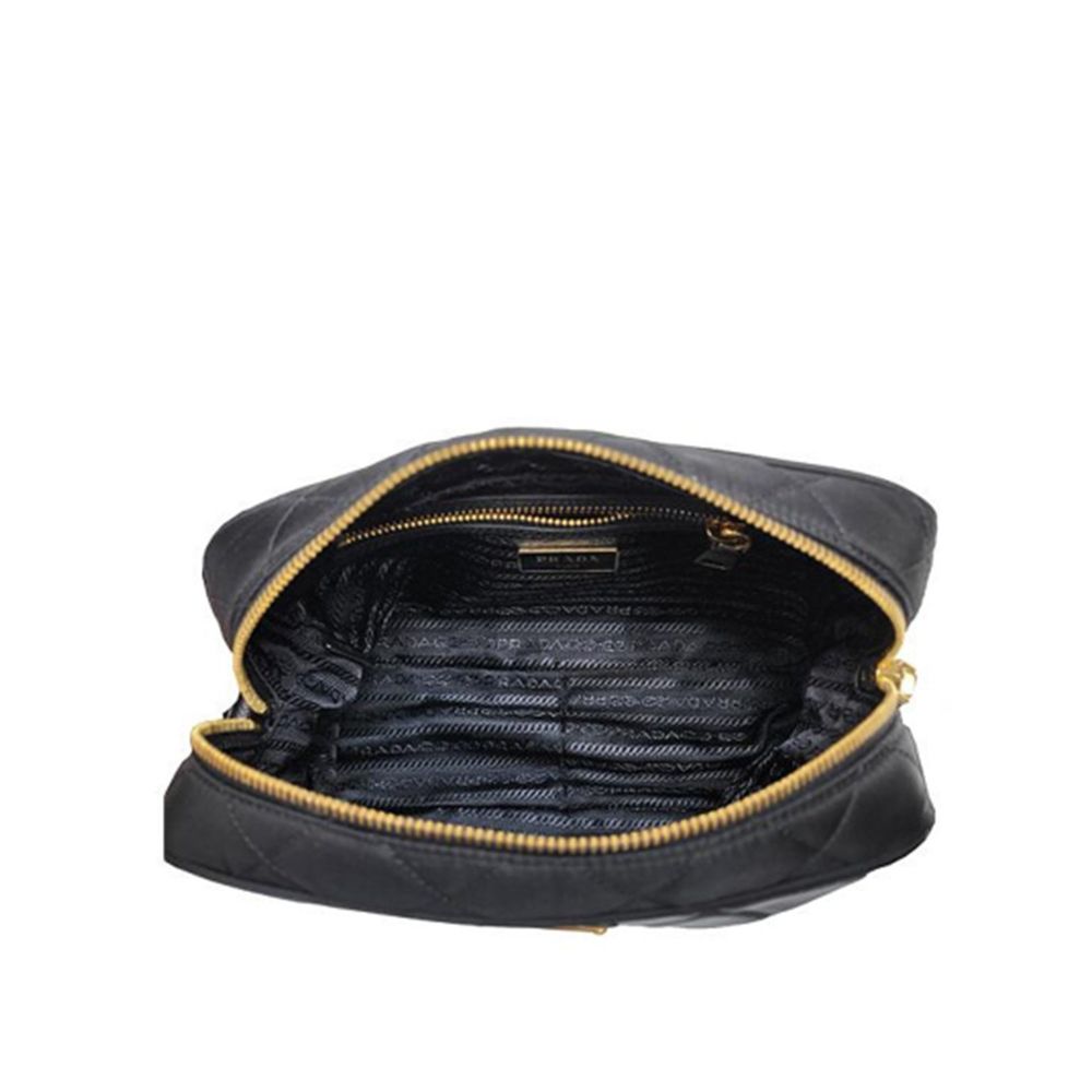 Shoulder Bag by Prada for women in nylon black features a effortless chic silhouette with a secure zipper, ample , and versatile shoulder-strap & detachable-strap for a effortless chic finish.
