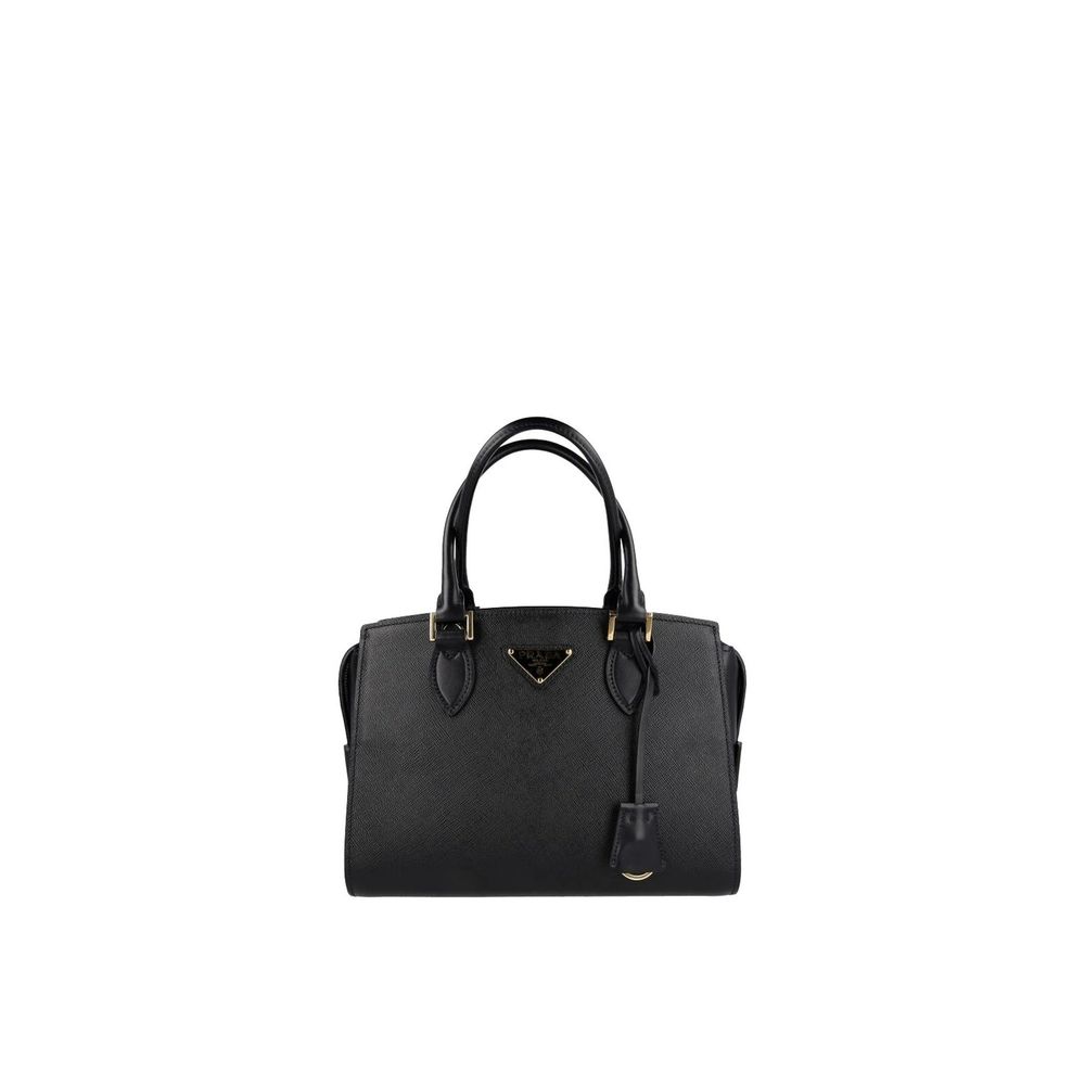Handbag by Prada for women in calfskin leather black presents a ornamental silhouette, showcasing a secure zipper, ample , and versatile handle for a ornamental finish.