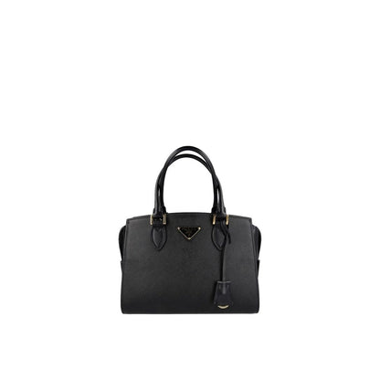 Handbag by Prada for women in calfskin leather black presents a ornamental silhouette, showcasing a secure zipper, ample , and versatile handle for a ornamental finish.