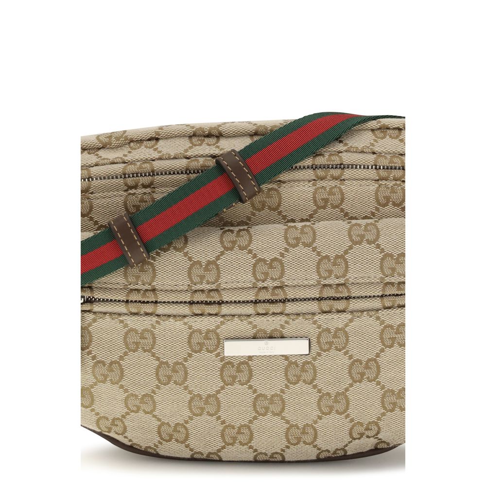 Small Shoulder Bag by Gucci for men in cotton polyester canvas beige, green, red, silver, signature & striped features a distinguished silhouette, showcasing a secure zipper and distinguished with versatile shoulder-strap & adjustable-strap for a distinguished finish.