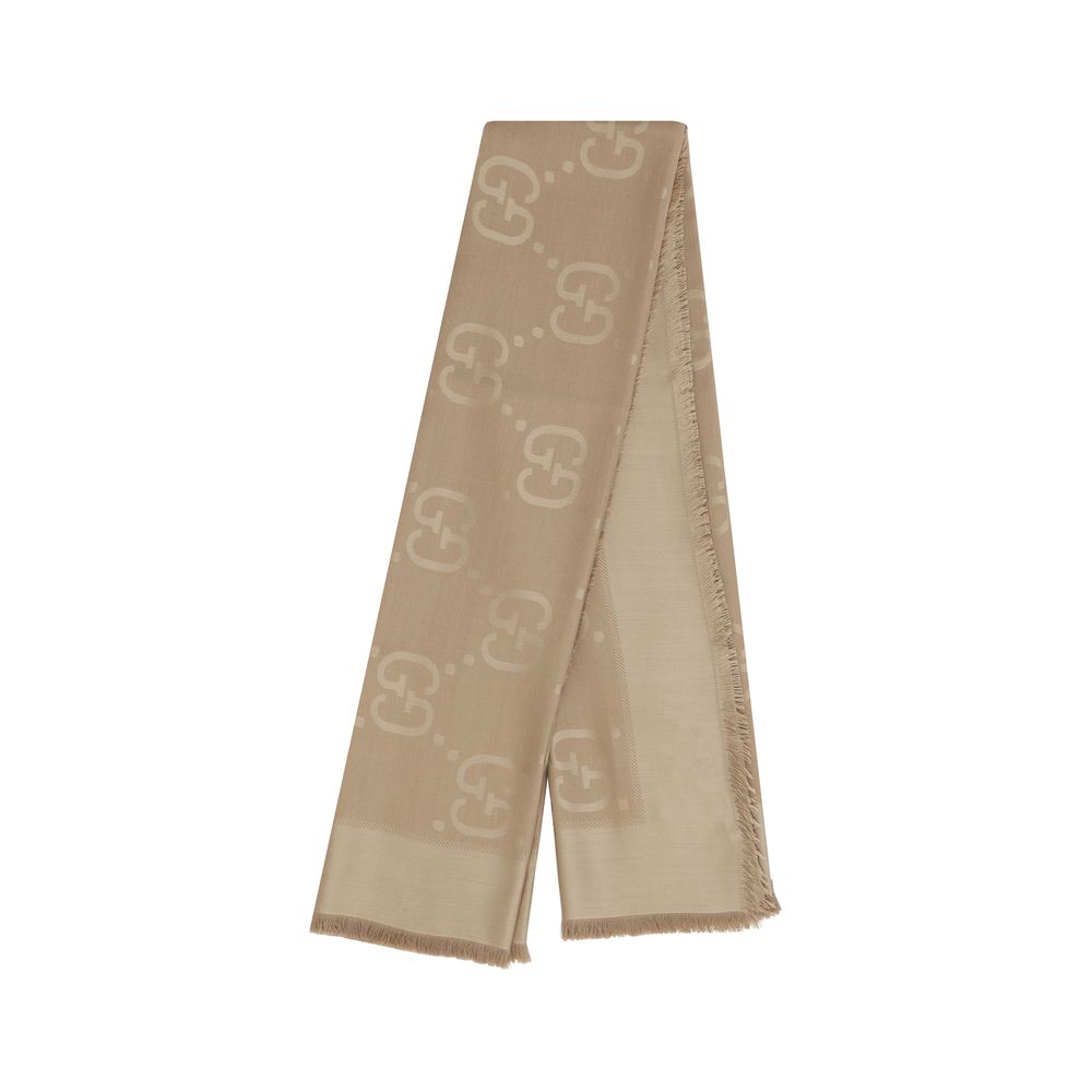 Scarf by Gucci for women in wool & silk brown, patterned & jacquard showcases a on trend silhouette, artfully capturing the on trend essence of the Gg Wool & Silk Foulard Frayed-Edge Scarf design with a sophisticated finish.