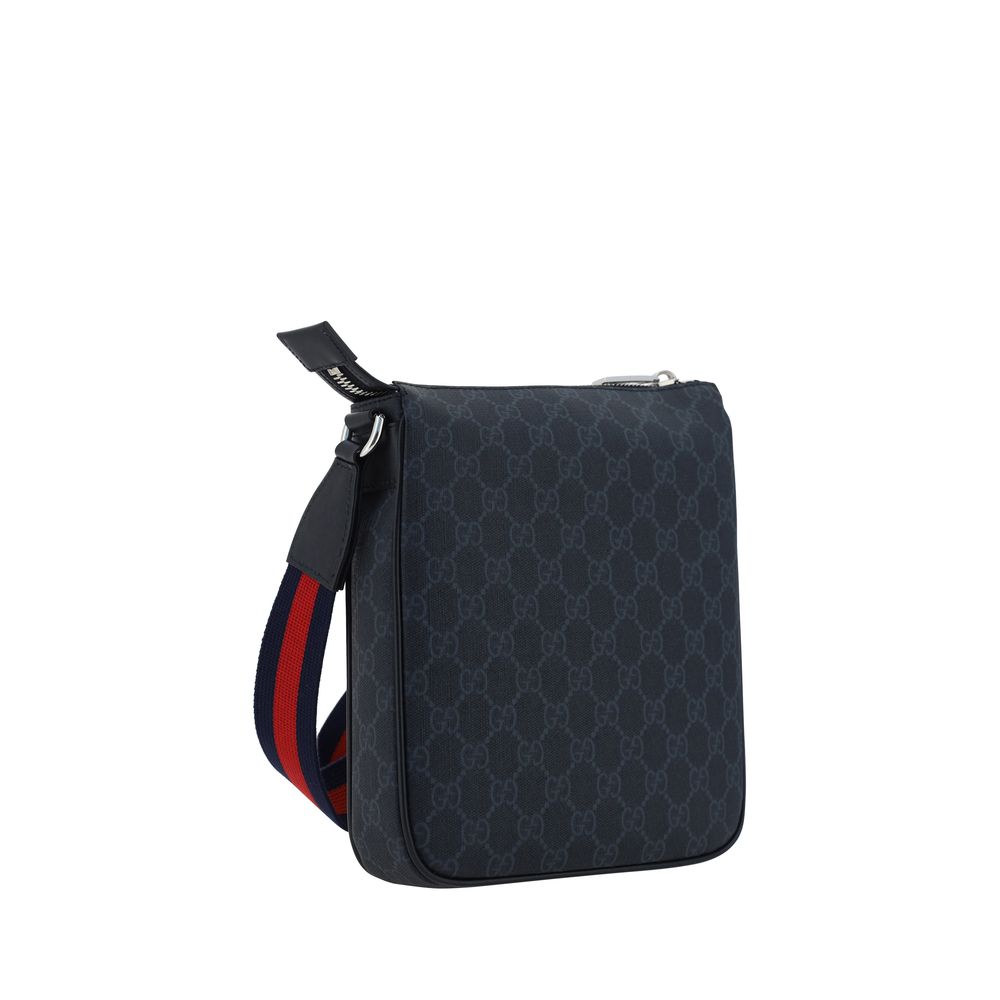 Shoulder Bag by Gucci for men in polyester polyethylene polyethylene & cotton black & print presents a versatile silhouette, showcasing a secure zipper and versatile with versatile shoulder-strap & adjustable-strap for a sophisticated look.